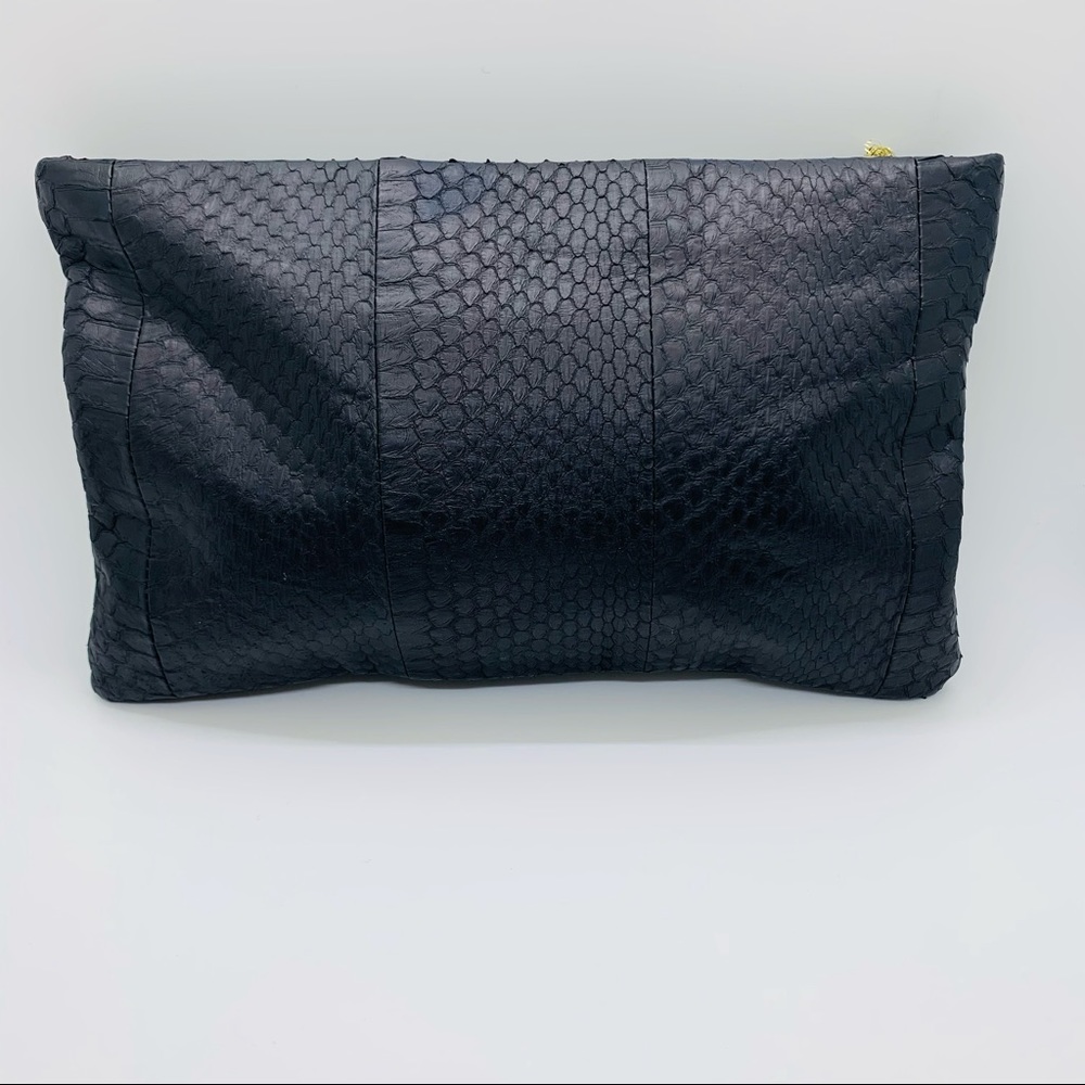 NWOT Felix Rey Black Clutch Zip across top of bag in black